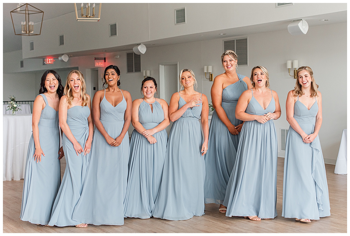Bridesmaids smiling together inside at The Eloise Wedding Barn