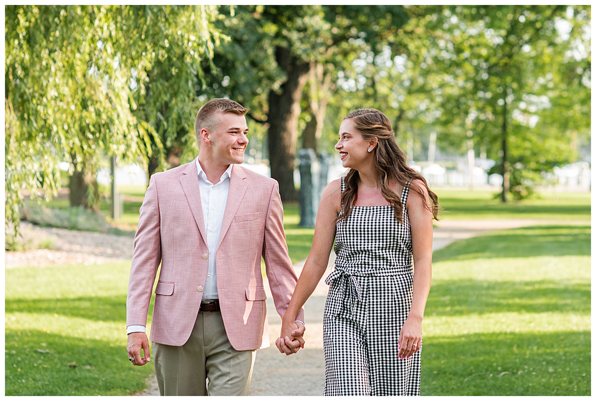 couple taking engagement photos in neenah wi
