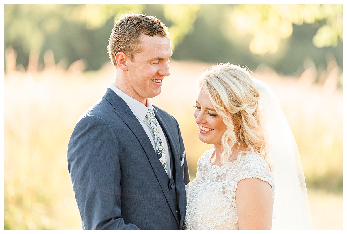 bride and groom laughing at pope farm by morgan madeleine photography, wisconsin wedding photographer