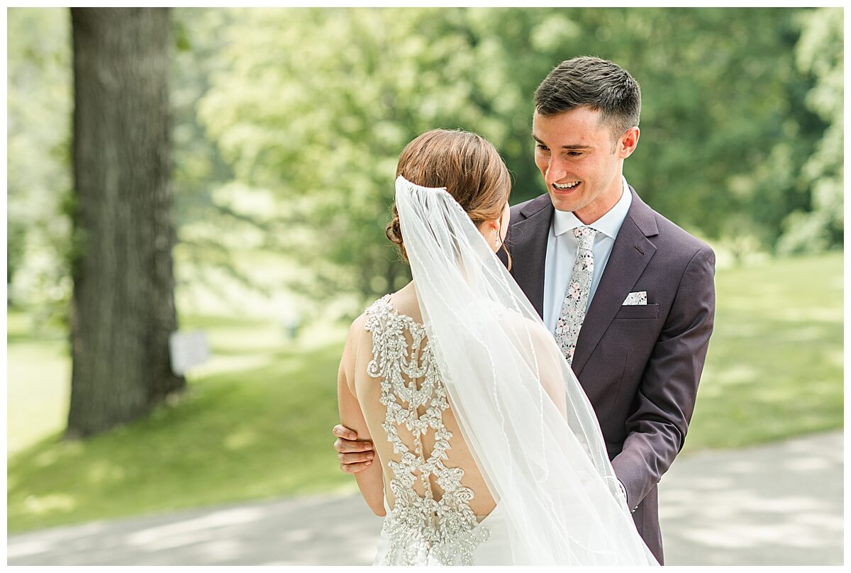 first look between bride and groom at a blackhawk country club wedding