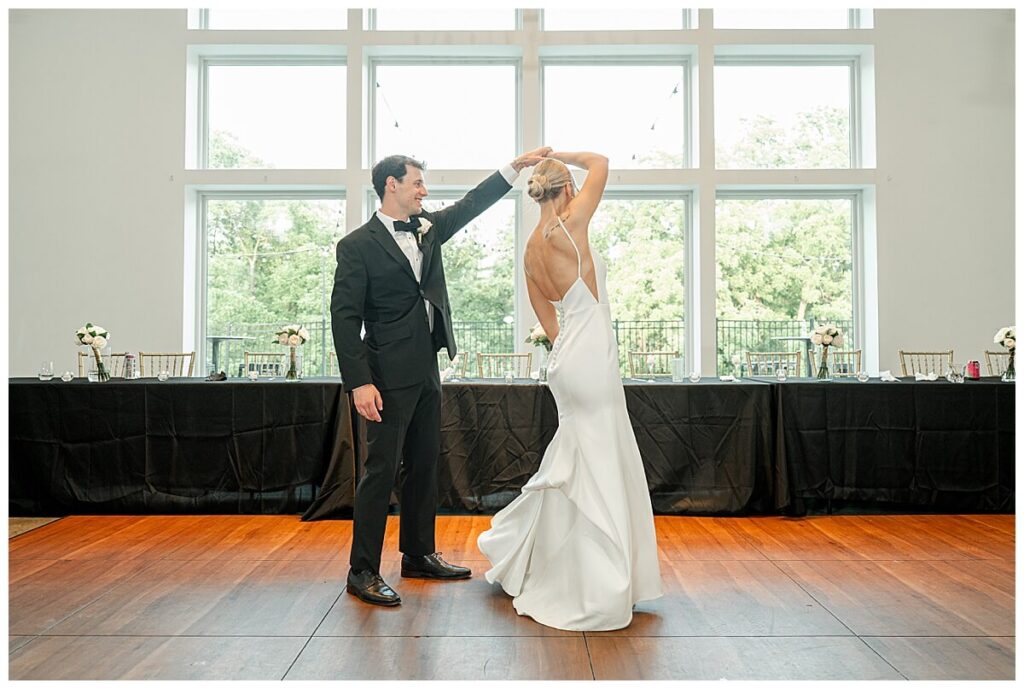 Couple twirling at The Eloise Wedding Barn in Mt Horeb near Madison